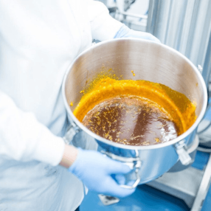 A pot full of subcritical CO2 full spectrum CBD hemp extract.