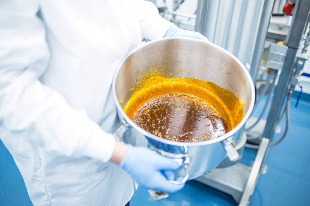 Amber full-spectrum hemp extract produced with subcritical CO2 extraction